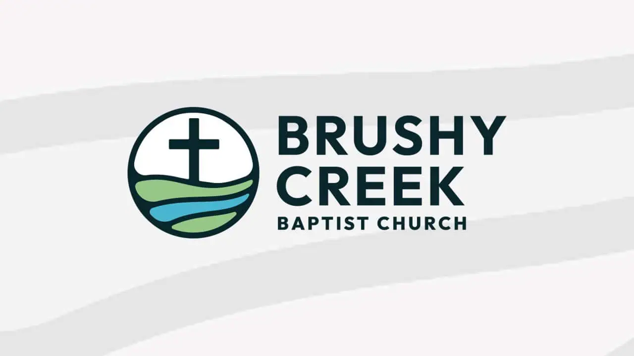 Brushy Creek Baptist Church with an animated image of a Christian cross